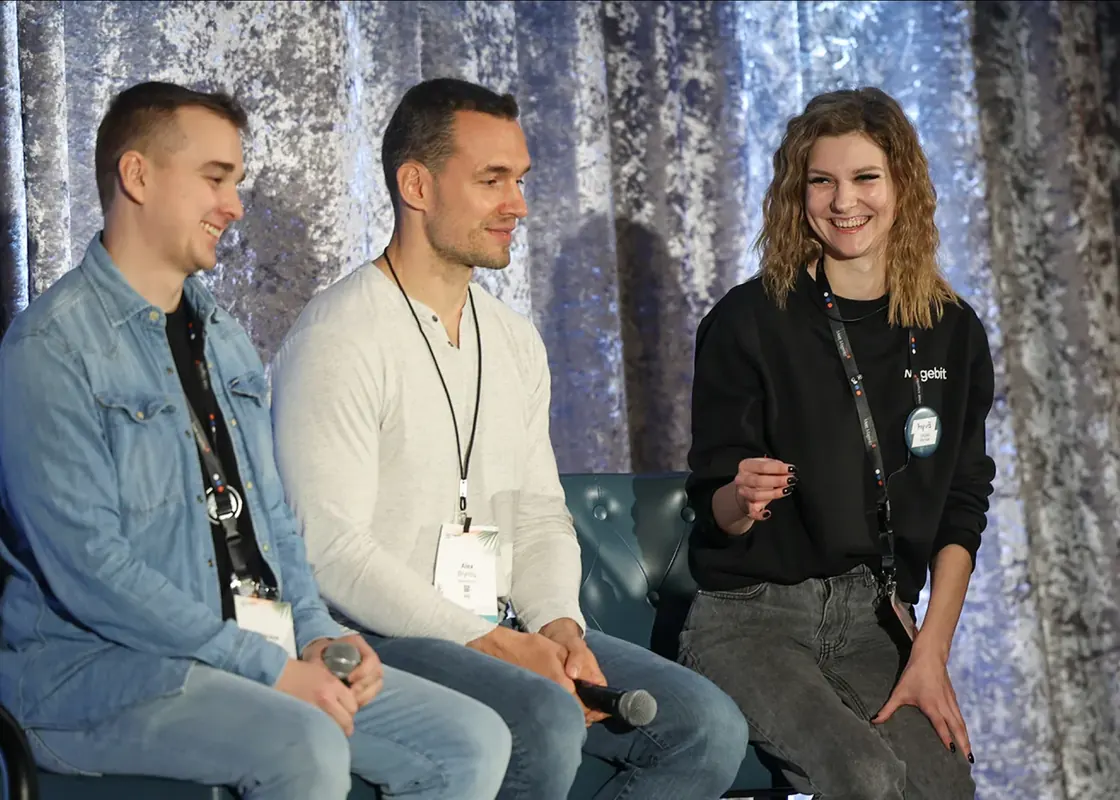 Alex Brynou of Helen of Troy speaking with Magebit on stage.