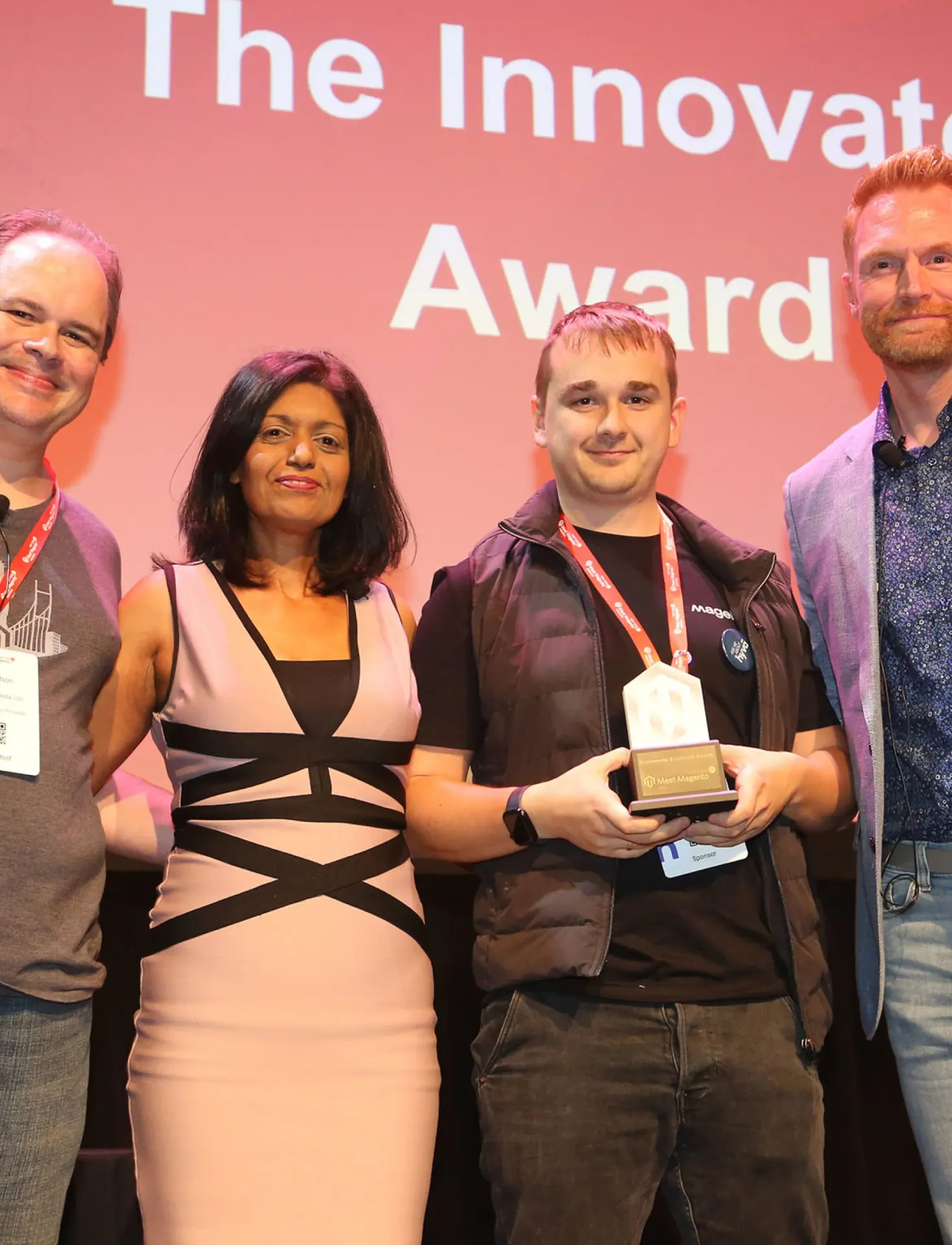 Magebit team receiving the Ecommerce Excellence Award at Meet Magento