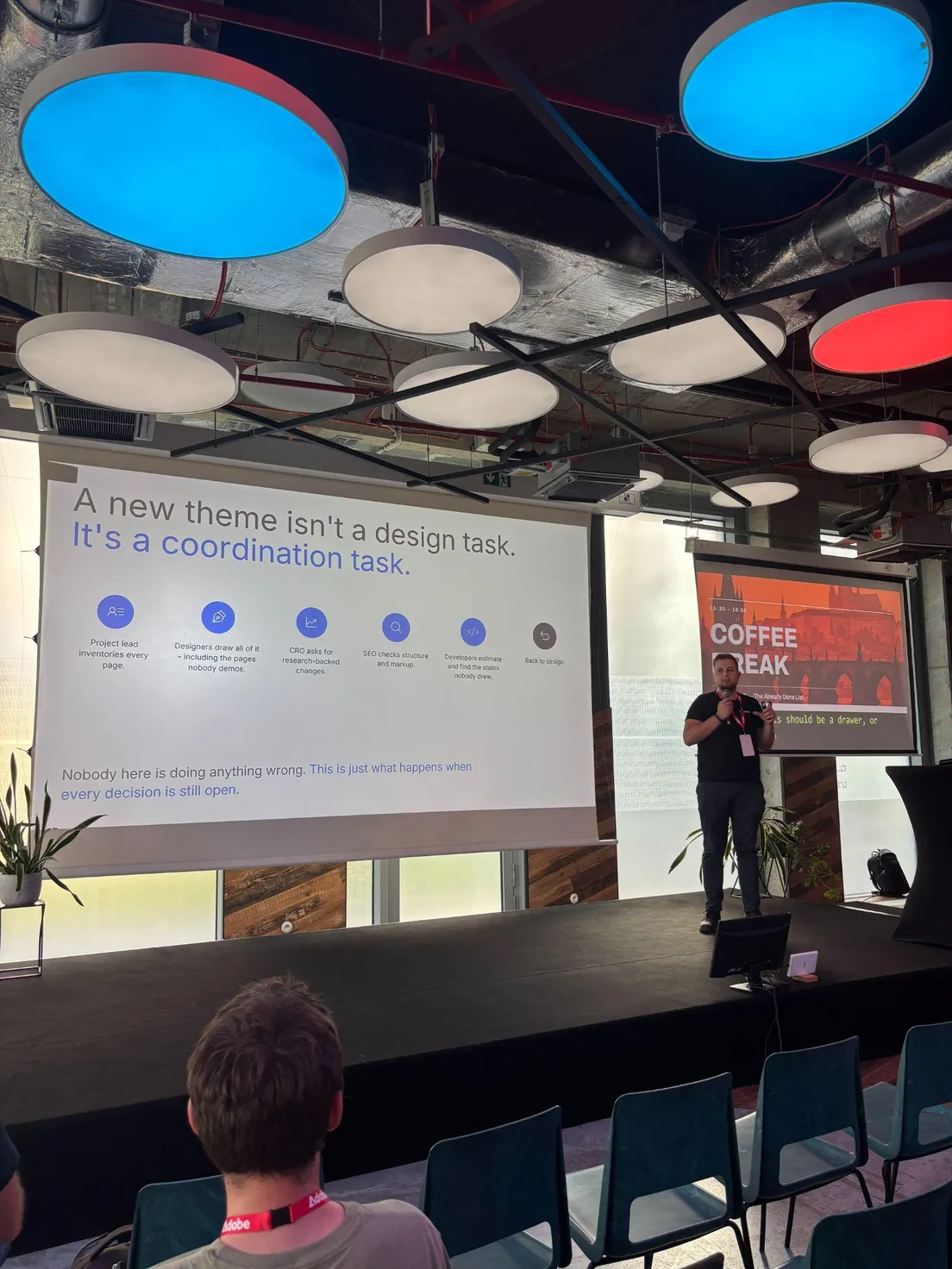 Rihards Ratke presenting Venta on the Meet Magento Czech 2026 stage