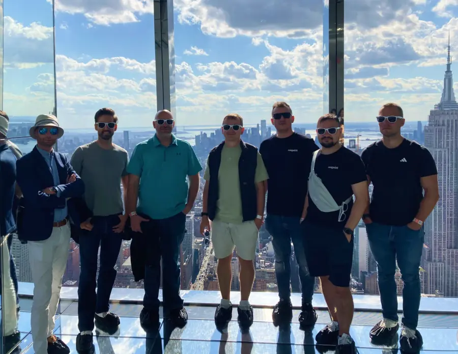 Magebit team overlooking New York from the Empire State Building