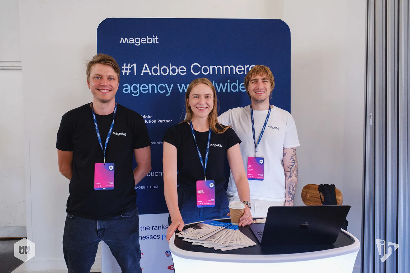 The Magebit team at their booth at Meet Magento UK 2026