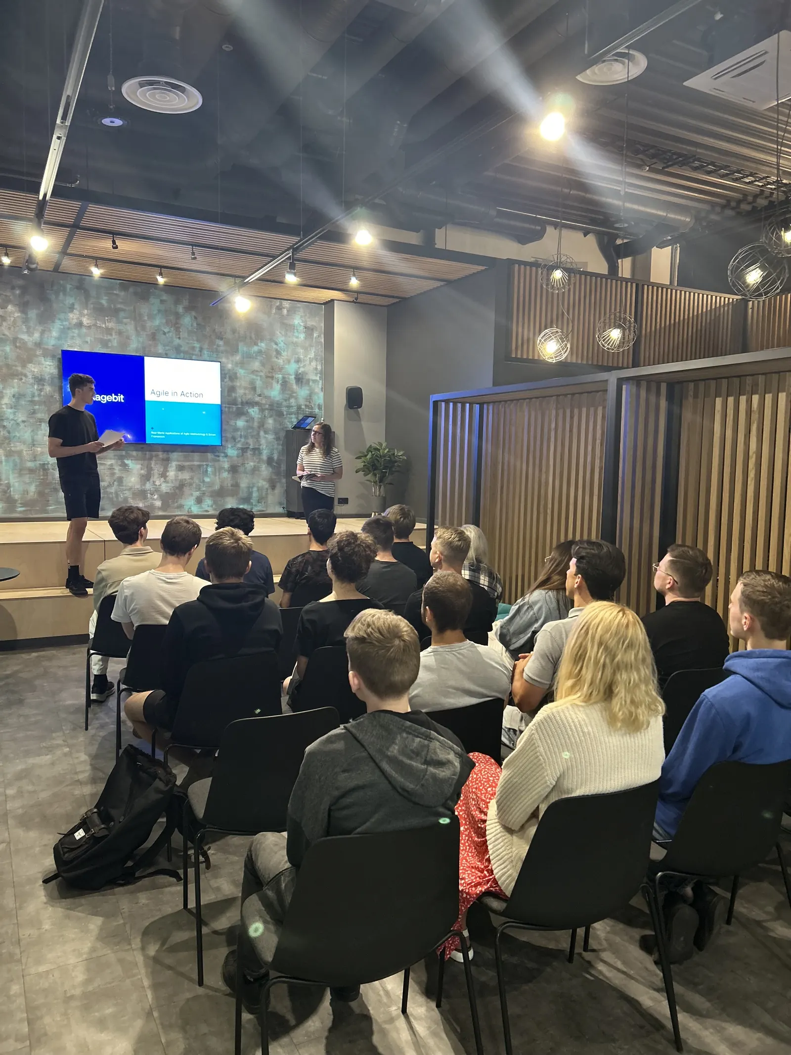 Guest speakers presenting "Agile in Action" to Magebit IT Bootcamp 2023 participants