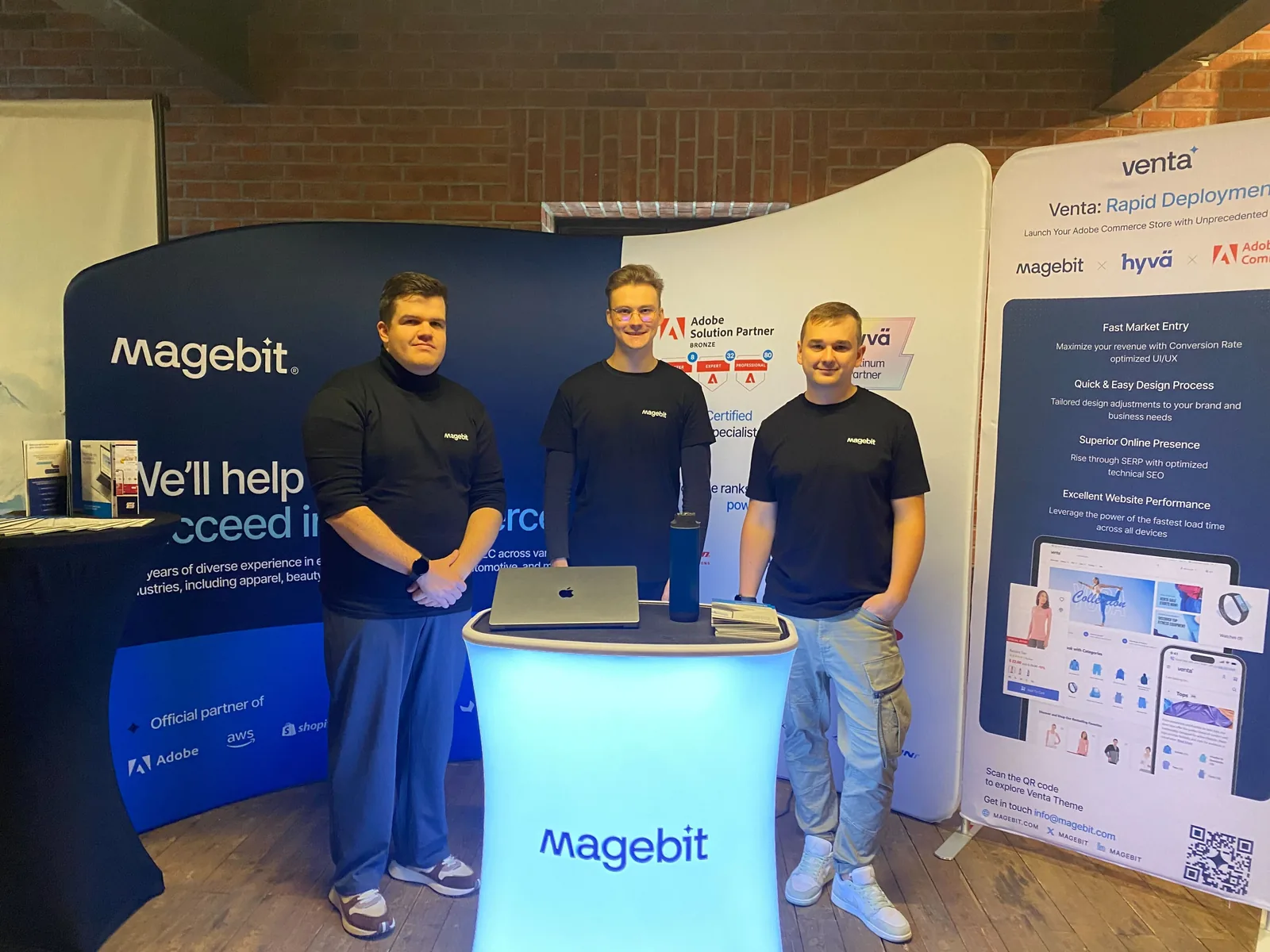 Magebit team at its booth at Meet Magento Poland 2024