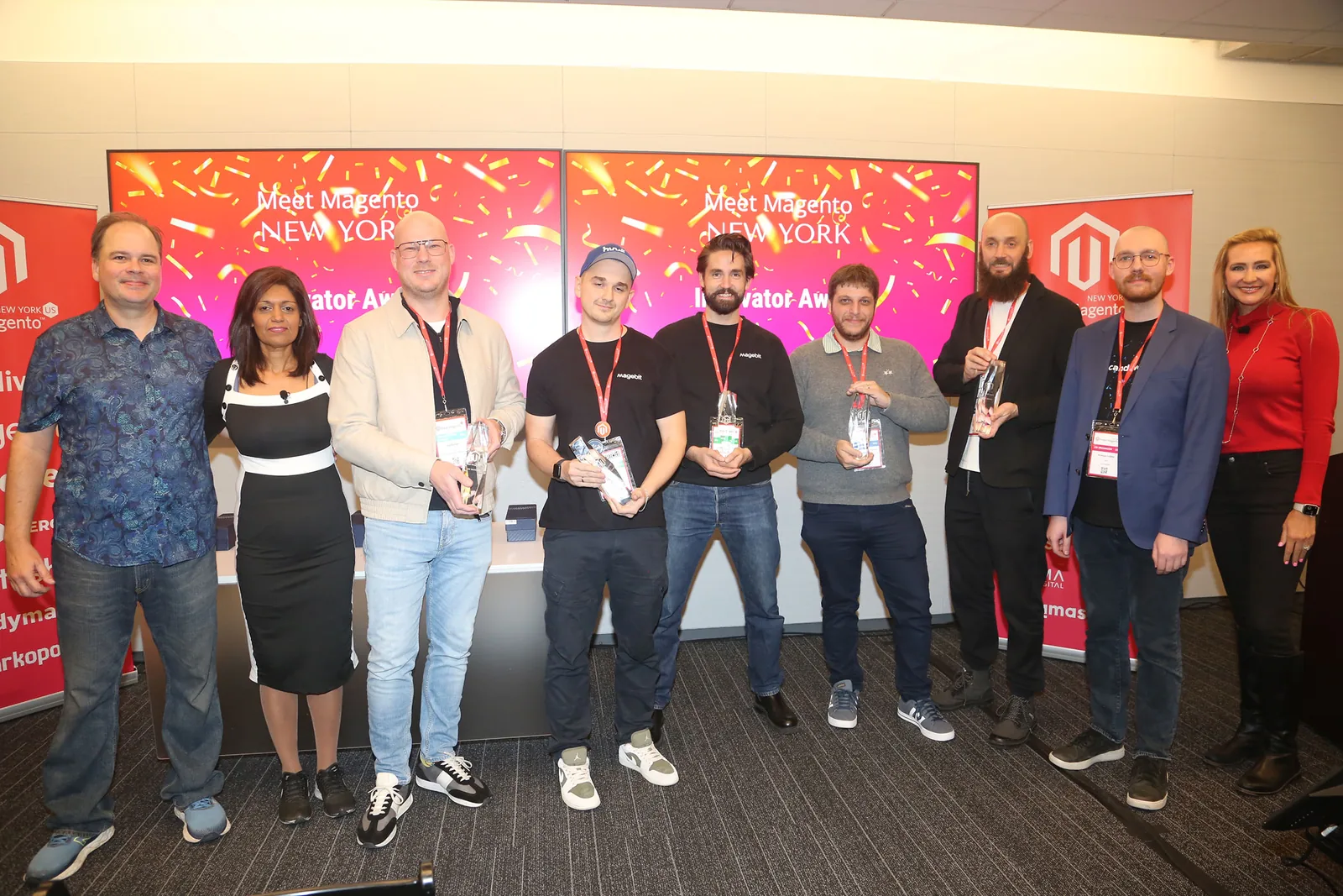 Group photo of award winners and presenters at Meet Magento New York 2025