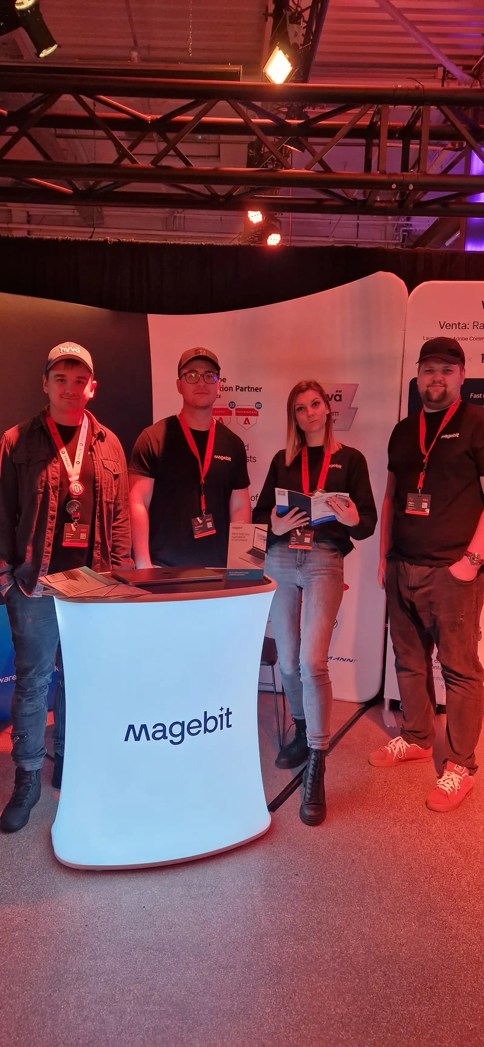 Four Magebit team members at the booth at Meet Magento Netherlands 2024