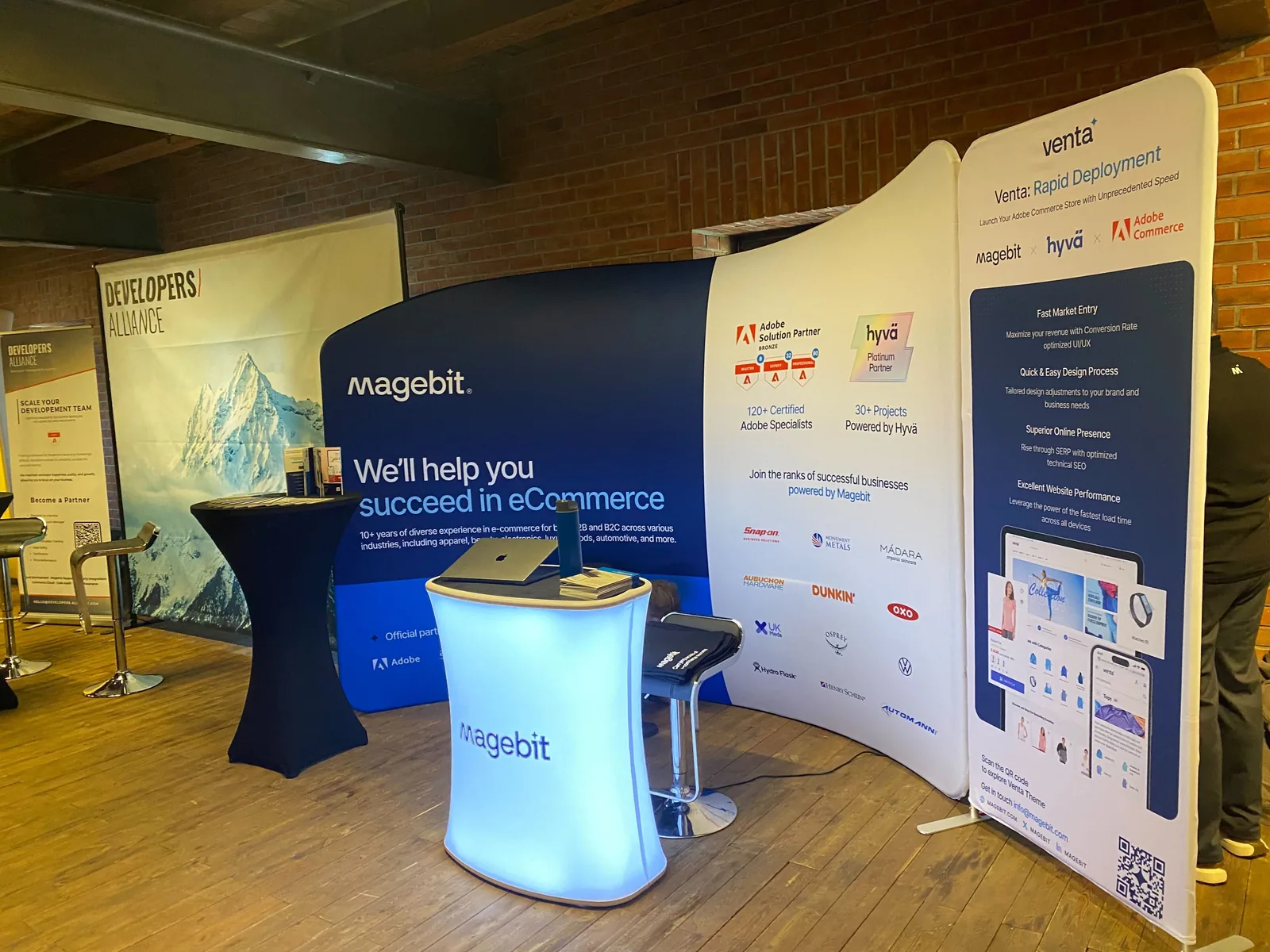 Magebit booth with Venta Rapid Deployment banner in the exhibition area of Meet Magento Poland 2024