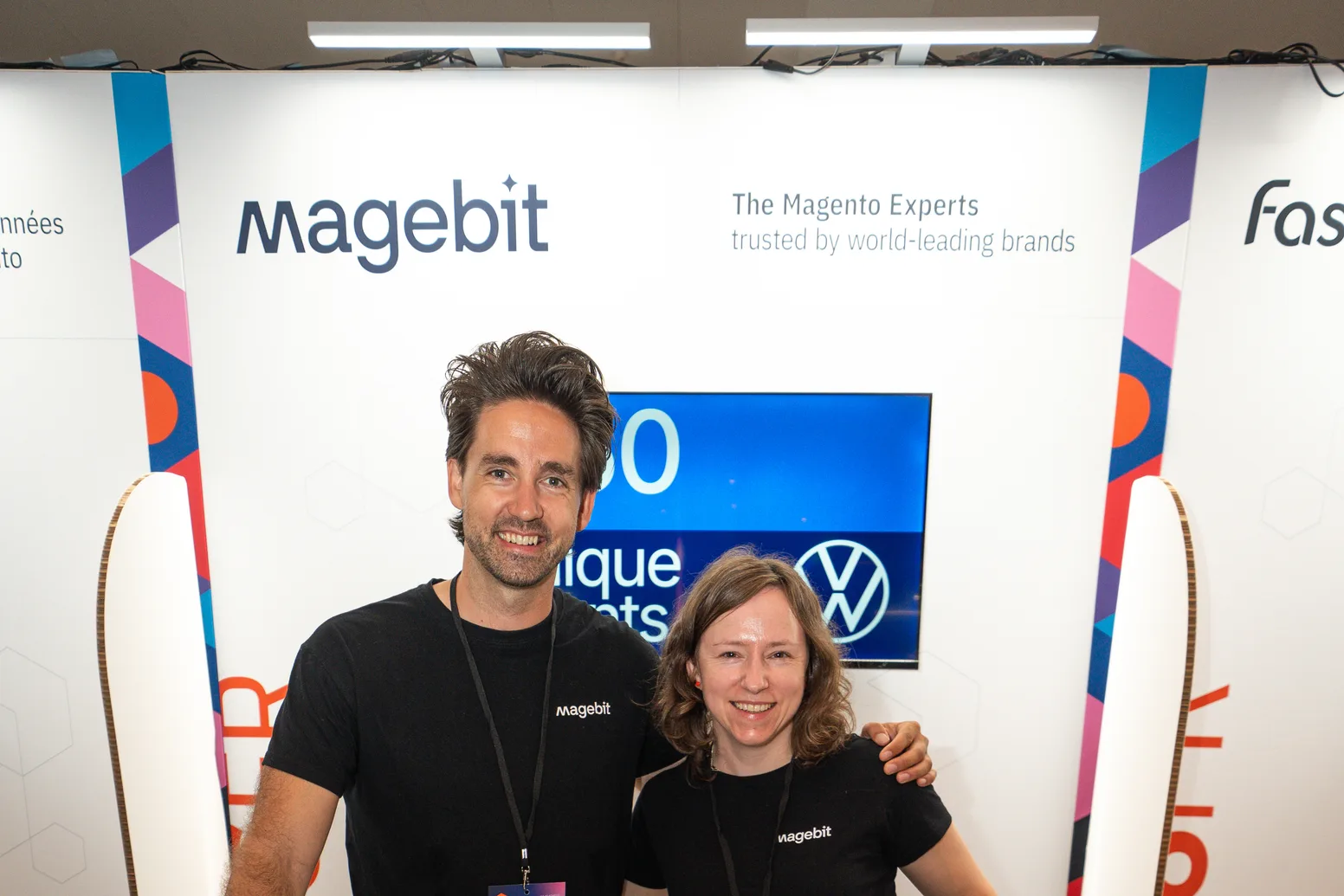 The Magebit team at their booth at Meet Magento France 2026