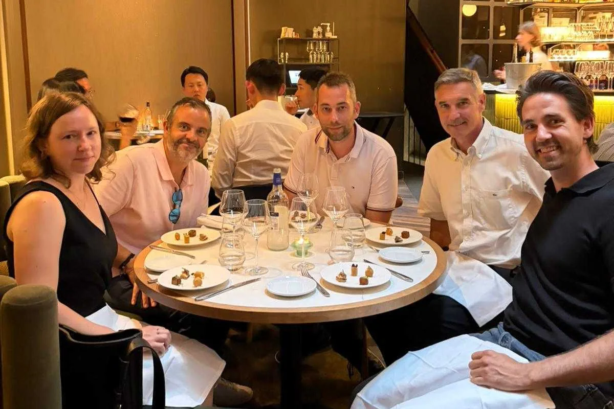 The Magebit team at a dinner during Meet Magento France 2026
