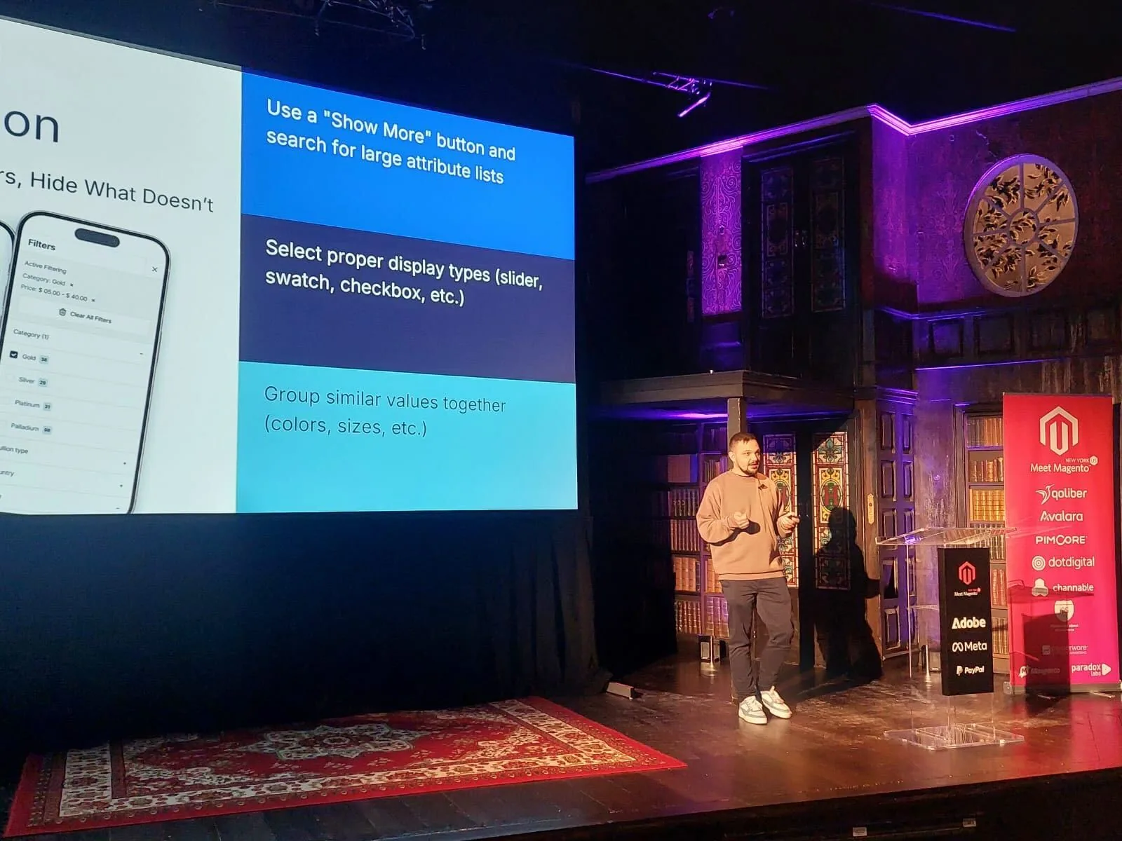 Speaker presenting on filter UX on the Meet Magento New York 2024 stage