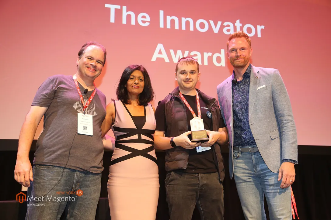 The Magebit team collecting the Innovator Award at Meet Magento New York.