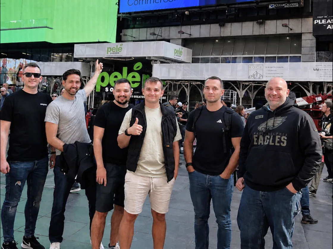 Six members of the Magebit team in Times Square, New York.